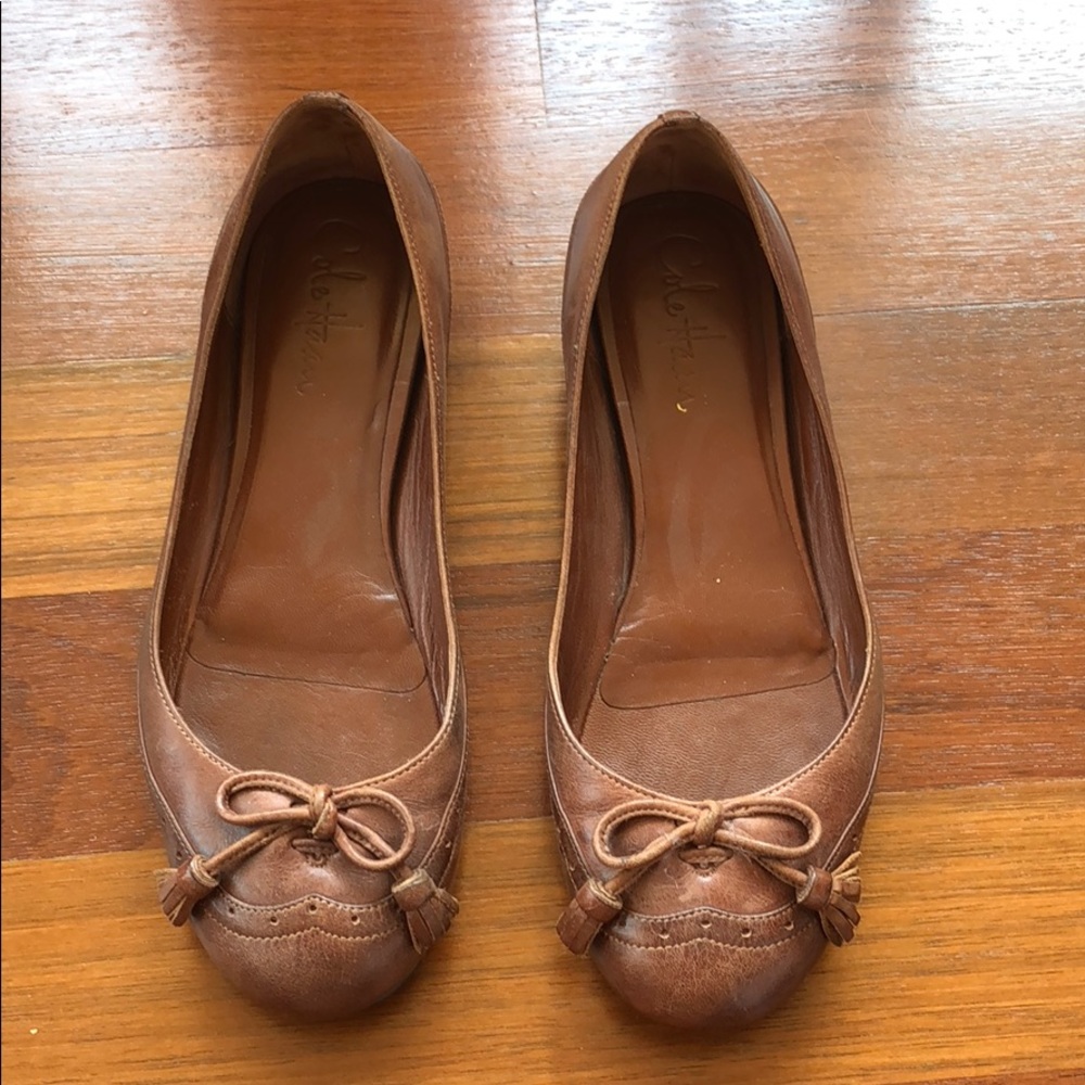 Brown leather flats
